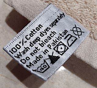 Towel from John Lewis with the wrong care label