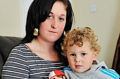 Toddler's arm ripped off by faulty washing machine