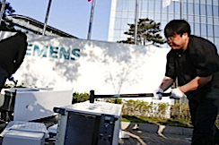 Chinese man smashes fridge in protest