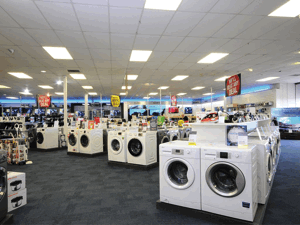 Appliance showroom stuffed with nice appliances people want to buy