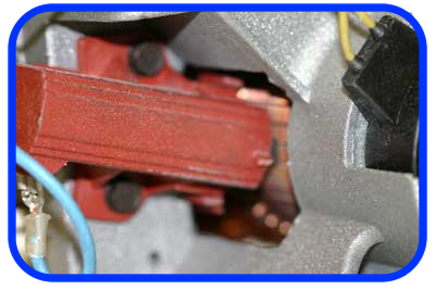 Carbon brushes in a Servis washing machine motor