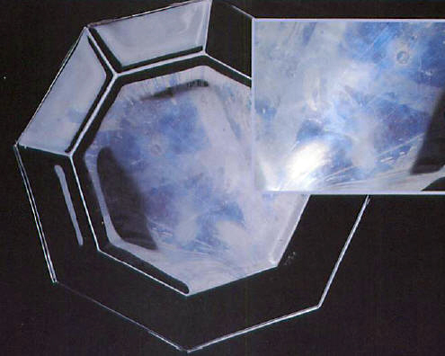 Scratch marks appearing on plates when washed in a dishwasher