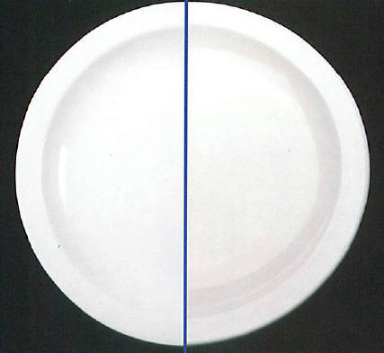 A plate going out looking dull from a dishwasher