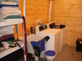 An equestrian laundry room for washing riding gear, blankets and so on