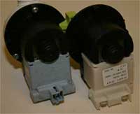 A Hotpoint and Servis drain pump, both from Plaset shown side by side