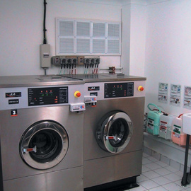 A typical commercail laundry room with domestic size machines