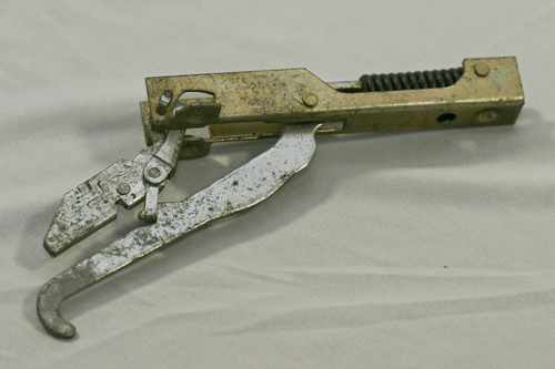 typical continental style oven door hinge locked in the open position
