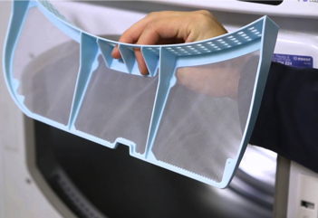 Pull the filter out and clean it, takes seconds and can save you money as well as prevent fire risk