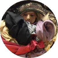 A washing machine drum from the back which is loaded correctly