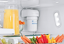 A water filter inside an American fridge freezer