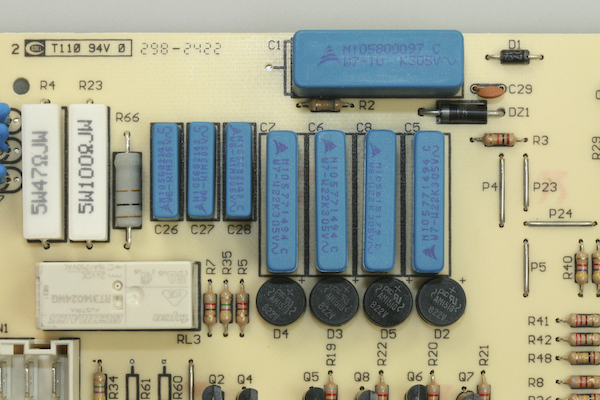 The C1 capacitor on the rear electronic control unit for Whirlpool made American side by side fridge freezer models