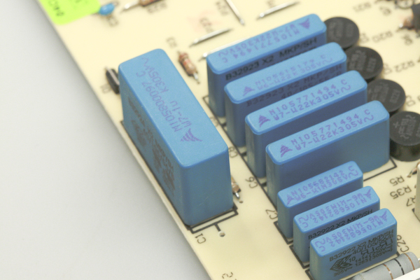 The capacitors on the rear electronic control unit for Whirlpool made American side by side fridge freezer models