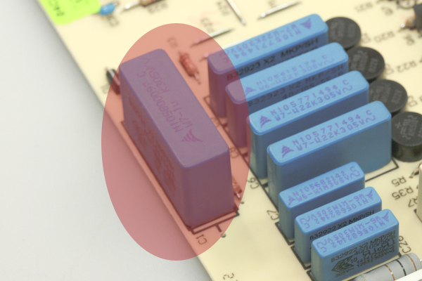 The C1 capacitor on the rear electronic control unit for Whirlpool made American side by side fridge freezer models
