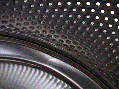 Holes, holes and more holes in a washing machine drum