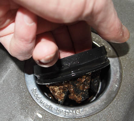 Pulling up the rubber feed guard